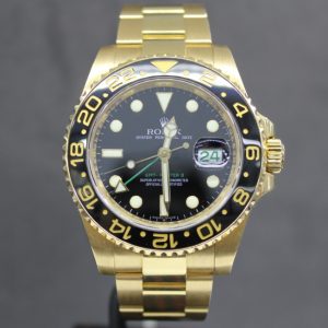 gold rolex with black face